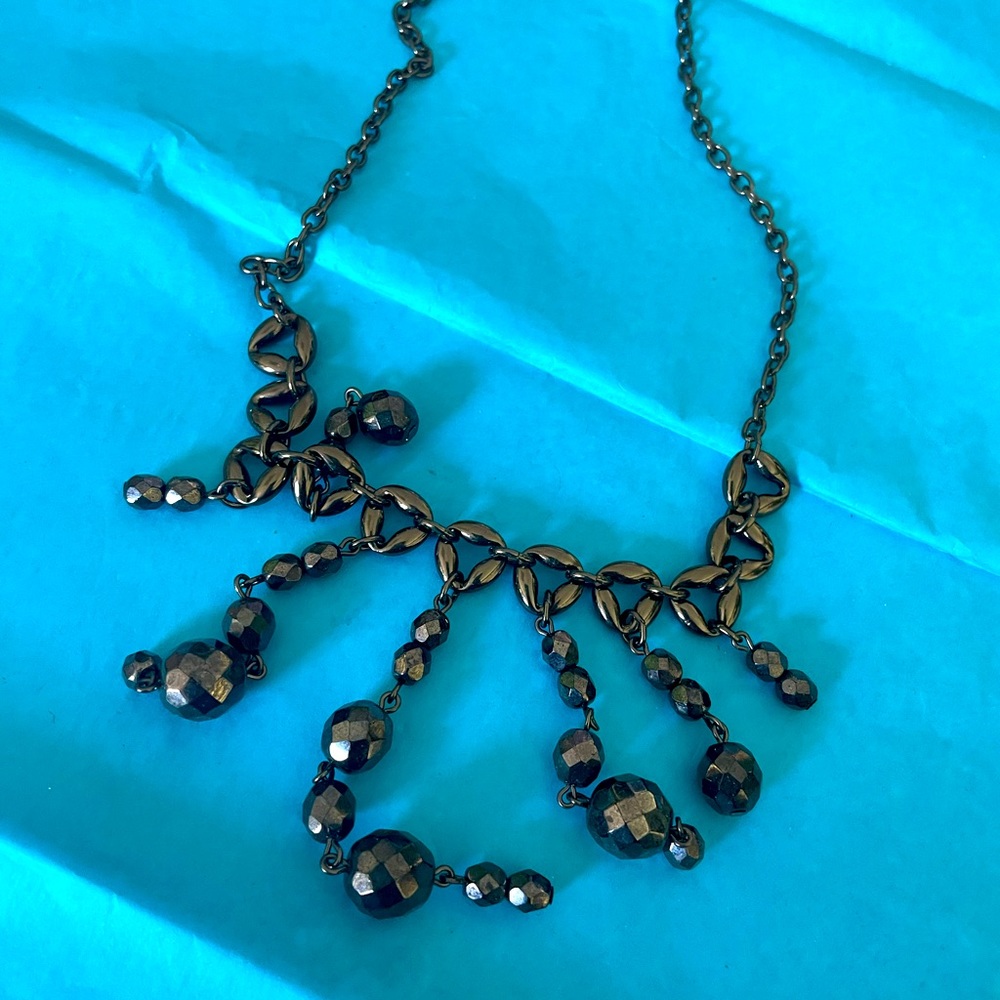 Delightful black beaded necklace.